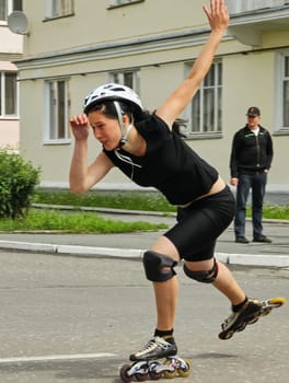 Russia, Volgodonsk - may 17, 2015: The ride on the rollers. Training for riding on roller skates.
