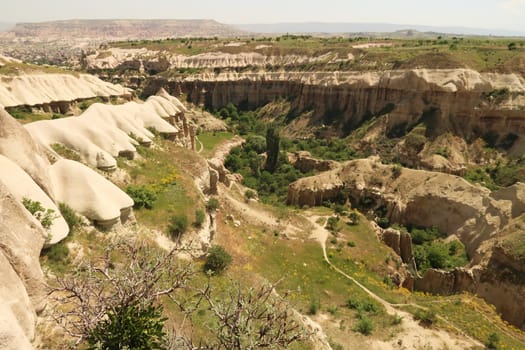 View from above into a gorge of the Pigeon Valley, Güvercinlik Vadisi connecting Göreme and Uchisar, Cappadocia, Turkey 2022