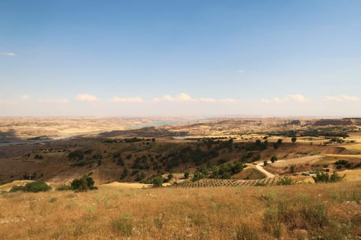 View from Karakus Tumulus, memorial grave of the Commagene Royal Family onto the surrounding landscape with the Atatürk Reservoir in the distance, close to Adiyaman, Turkey 2022