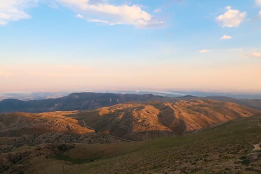 View from Mount Nemrut onto the surrounding landscape before sunset, the Atatürk Reservoir is visible in the background, close to Adiyaman, Turkey 2022
