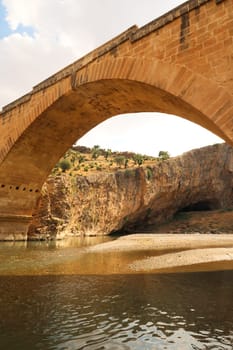 Looking up to the Severan, Cendere Bridge from below, roman bridge close to Adiyaman, Turkey 2022