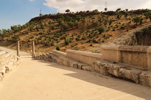 View from the the Severan, Cendere Bridge, onto the two columns at its entrance, close to Adiyaman, Turkey 2022
