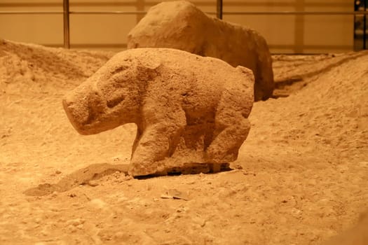Neolithic stone sculpture, statue of a wild boar found in the area of Göbekli Tepe and displayed in the Sanliurfa Museum, Sanliurfa, Turkey 2022