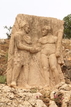 Relief depicting a handshake between King Mithridates, Antiochus I of Commagene and Heracles, at Site III at the ancient site of Arsameia on the Nymphaios, close to Adiyaman, Turkey 2022