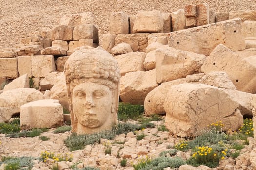 Head of a stone statue, sculpture of the Goddess of Commagene on the West Terrace of Mount Nemrut, close to Adiyaman, Turkey 2022
