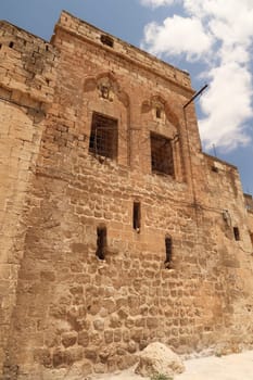 Facade of a traditional house in the old town of Mardin, Turkey 2022