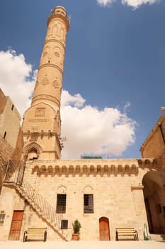 The facade and minaret of the Great, Grand Mosque, Ulu Camii in the old town of Mardin, Turkey 2022