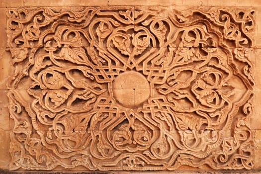 Elaborate ottoman pattern carved on a wall in the second court inside the Ishak Pasha Palace, Sarayi, Dogubeyazit, Turkey 2022