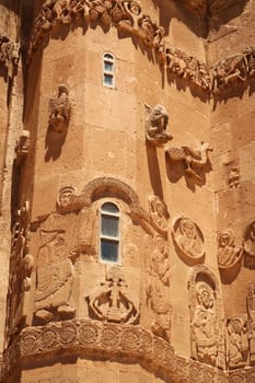 Closer look on the elaborate bas-relief, relief carvings on the facade of the Armenian Cathedral of the Holy Cross showing biblical scenes, Akdamar Island, Lake Van, Van Gölü, Van, Turkey 2022