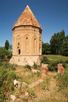 Overgrown trail lined by tombstones leading to the Halime Hatun tomb, grave, mausoleum, Halime Hatun Kümbeti, close to Lake Van, Van Gölü, Gevas, Turkey 2022