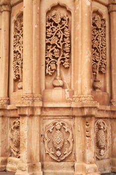 Elaborate floral, flower carvings on an ottoman tomb in the second court inside the Ishak Pasha Palace, Sarayi, Dogubeyazit, Turkey 2022