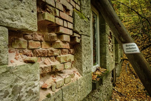 Bricks in a lost place wall hydroelectric power station fall