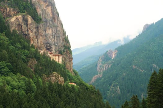 Spectacular view onto the Sumela, Sümela Monastery, built on a cliff above a dense forest next to a gorge, Trabzon, Turkey 2022