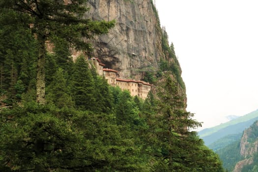 Spectacular view from the Aya Varvara Church, Kilisesi onto the Sumela, Sümela Monastery built on a cliff above a dense forest, Trabzon, Turkey 2022