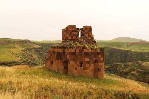 Ruins of the Hexagonal Church, Church of Abu'khanm inside of the Citadel the ancient site of Ani, an abandoned ruined armenian city, close to Kars, Turkey 2022