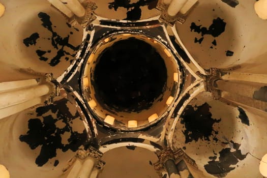 Inside the beautiful Church of St., Saint Gregory of Abughamir, Abughamrens, Abughamrents looking up to the ceiling, cupola, dome at the ancient site of Ani, an abandoned ruined armenian city, close to Kars, Turkey 2022