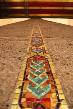 Elaborate and colorful strip of mosaic running on the columns to the gold and red ceiling inside the Hall of Honor, the mausoleum that houses the tomb of Mustafa Kemal Atatürk, Ataturk at the Anitkabir monument, memorial, complex, Ankara, Turkey 2022