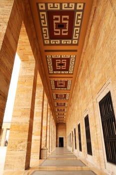 Collonade, aisle with colorful patterns on the ceiling at the Anitkabir monument, complex, memorial, Ankara, Turkey 2022