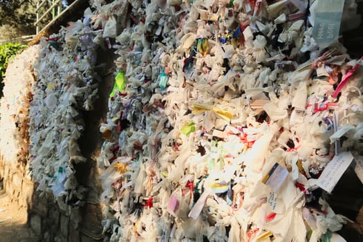 Hundreds of wishes at the Wish Wall close to the famous House of Virgin Mary, Selcuk, Turkey 2022