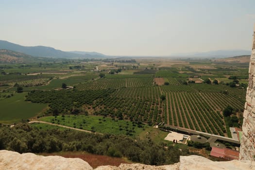 Spectacular view from Ayasuluk Castle in Selcuk onto the surrounding fields, near Ephesus, Turkey 2022