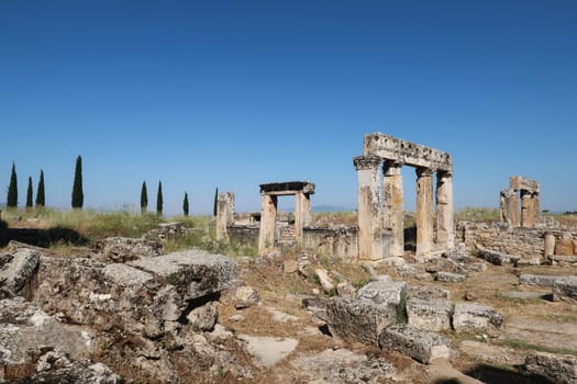 Ramaining structures of the Nymphaeum on the main street of the ancient ruins of Hierapolis, Pamukkale, Denizli, Turkey 2022