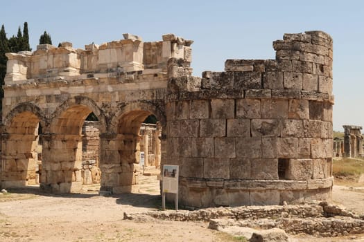 The Domitian Gate at the ancient ruins of Hierapolis, next to Pamukkale, Denizli, Turkey 2022