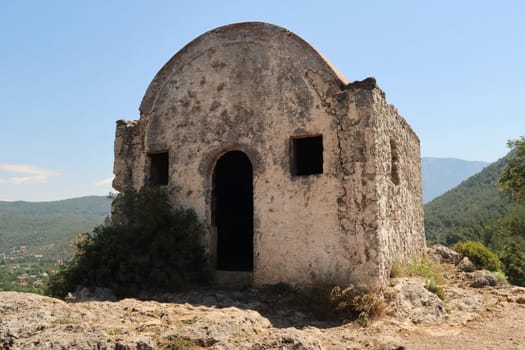 The high chapel above the abandoned village of Kayaköy, near Fethiye, Turkey 2022