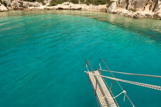 Diving into the turquoise blue sea of the Esmeralda Emerald Bay on our Kekova Island boat tour, near Demre, Turkey 2022