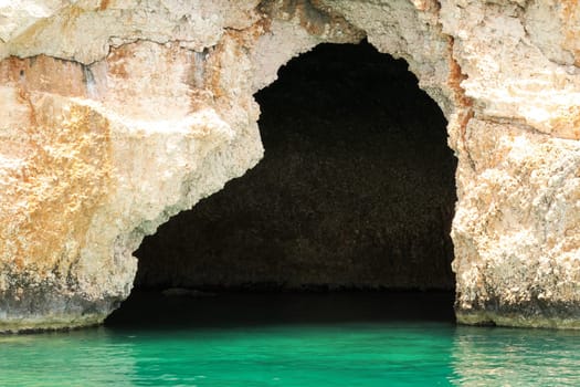 The famous Pirate Cave or Blue Cave on Asirli Island in the Gökkaya Bay close to Demre, Turkey 2022
