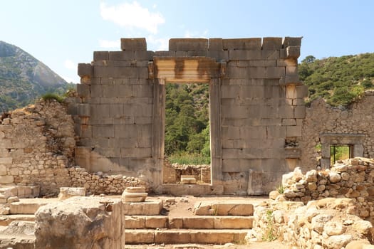 The giant sella, cella door, entrance to Ionic Temple at the ancient site of Olympos, Olympus, built in the name of the Roman Emperor Marcus Aurelius, close to Antalya, Turkey 2022