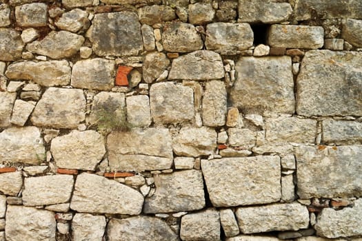 Close up view onto the bricks of a roman wall across the river at the ancient site of Olympos, Olympus, close to Antalya, Turkey 2022