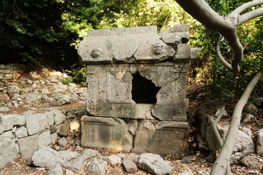 The partly broken Sarcophagus of Antimachos at the ancient site of Olympos, Olympus, close to Antalya, Turkey 2022