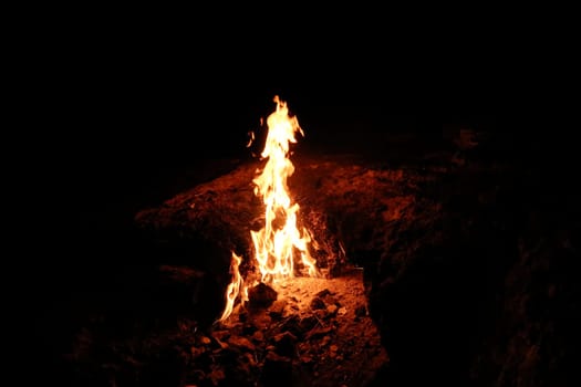One of the eternal flames of Mount Chimaera at night, close to Antalya, Turkey 2022