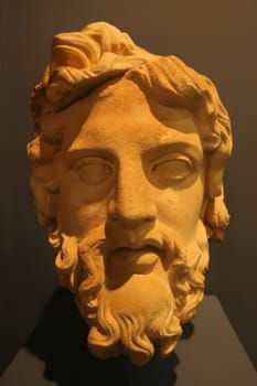The head of the greek god Zeus, carved out of marble, displayed at the archaeological museum of Ephesus, Selcuk, Turkey 18th of May 2022