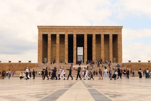 Turkish soldiers are marching on the Ceremonial Plaza of the Anitkabir complex, monument, memorial with the Hall of Honor in the background, housing the tomb, mausoleum of Atatürk, Ataturk, Ankara, Turkey, 1st of July 2022