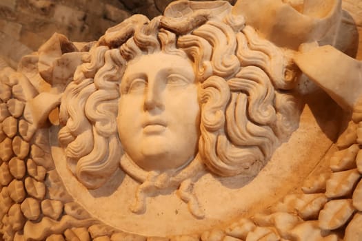 Head of medusa relief on a roman sarcophagus at the Hierapolis museum, Pamukkale, Denizli, Turkey, 20th of May 2022