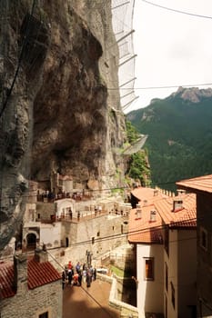 A lot of visitors inside the court, yard, courtyard of Sumela, Sümela Monastery, Trabzon, Turkey, 23rd of June 2022