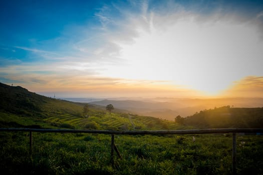 Sunset valley view with terraced fields of Serra de Monchique near mount Foia in the Algarve region in Portugal. Beauty in nature.