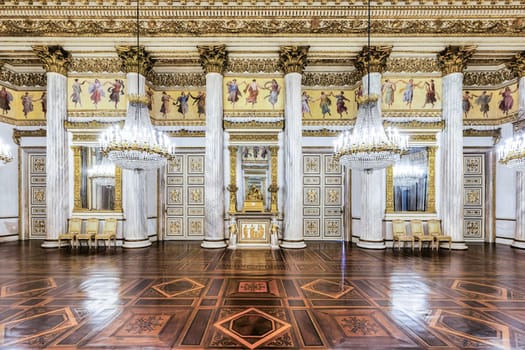 Turin, Italy - 17 november 2023: baroque ballroom interior in Royal Palace, 1842. Luxury marble, antique chandelier, classic floor