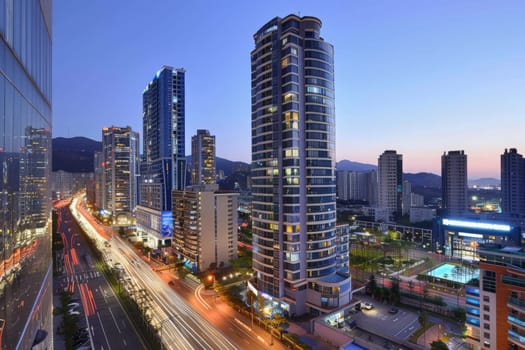 Evening descends on a bustling South Korean cityscape, with dynamic light trails and towering skyscrapers.