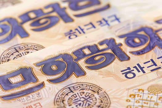 Close-up of a detailed South Korean banknote, showcasing intricate design and cultural significance.
