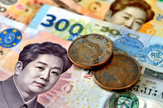 Close-up view of South Korean currency featuring intricate details and coins.