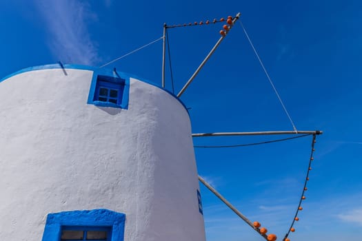 Traditional portuguese windmill near Ericeira, Lisbon, Portugal