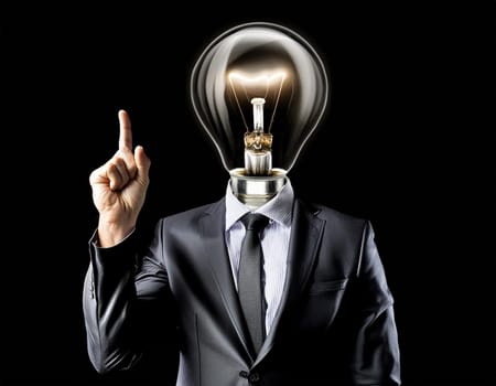 Creative light bulb: A headless man with his light bulb head glowing symbolizes a brilliant idea.