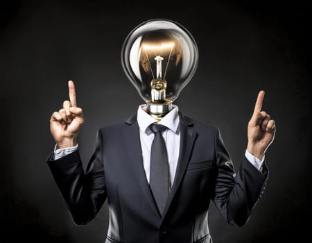 Creative light bulb: A headless man with his light bulb head glowing symbolizes a brilliant idea.
