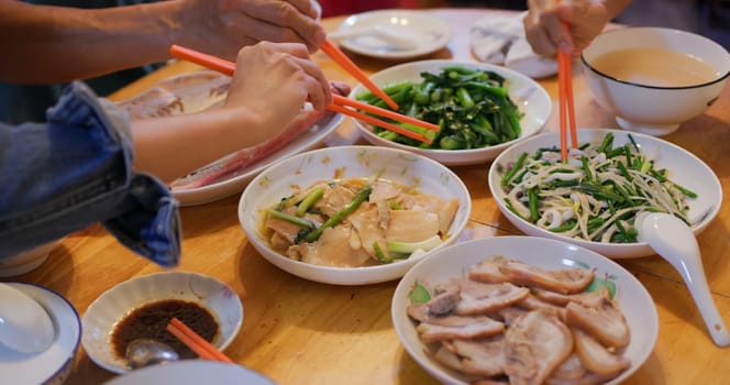 Hong Kong style home cuisine, family dinner concept, steamed fish, fry vegetable and meat