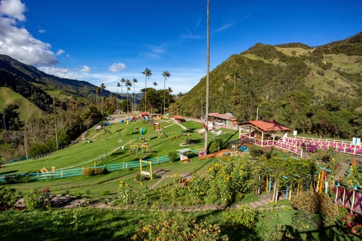 Entertainment center in Valle del Cocora Valley with tall wax palm trees. Salento, Quindio department. Colombia travel destination.