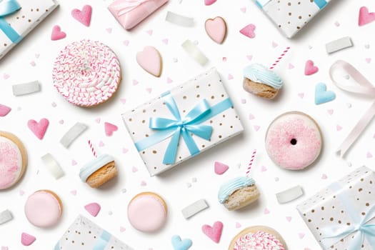 Festive arrangement of gifts, treats, and decorations celebrates a special birthday moment.
