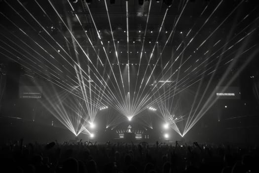 Silhouetted concert crowd dancing under vibrant lights, expressing joy and unity through music.