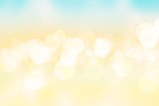 Abstract bright gradient motion spring or summer landscape texture background with natural gold yellow bokeh lights and blue bright sunny sky. Beautiful backdrop with space for design.